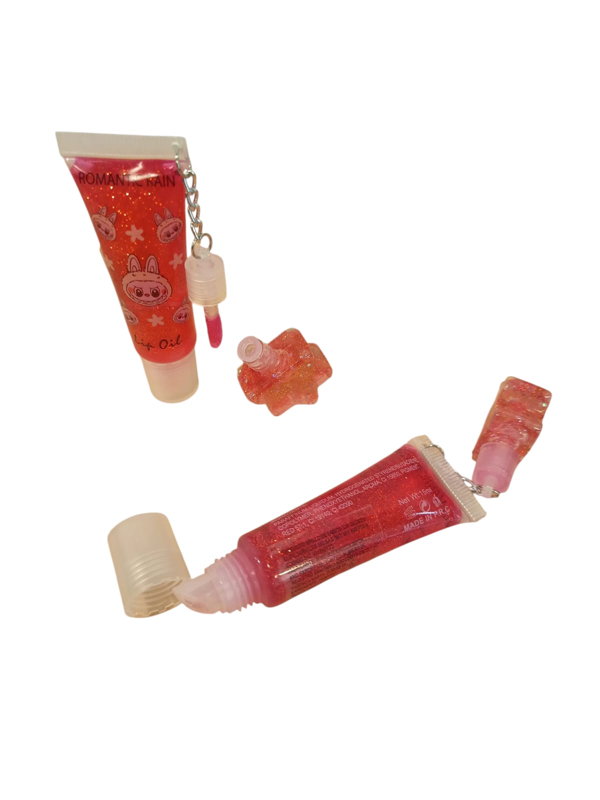 LIP OIL COJIN CON LLAVERO ESCARCHA TIPO LLAVERO R2597
