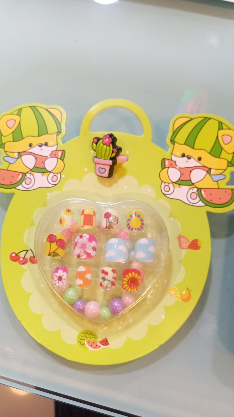 UÑAS POSTIZAS DECORADAS 12 UNIDADES CON ANILLO + PULSERA - EMPAQUE OSITO - FAN-537